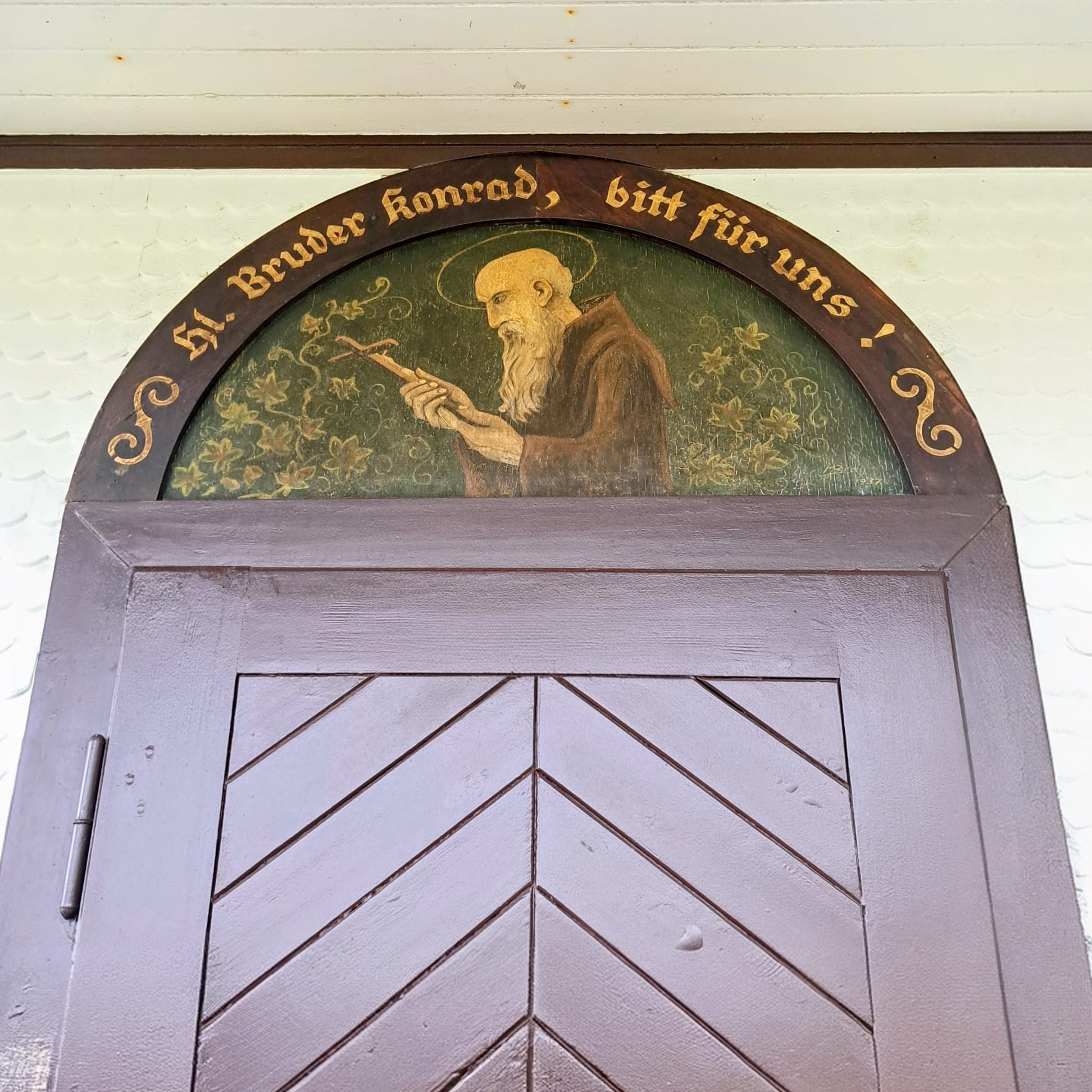 Lunettengemälde Hl. Bruder Konrad über der Eingangstür der Konradskapelle Seelbach